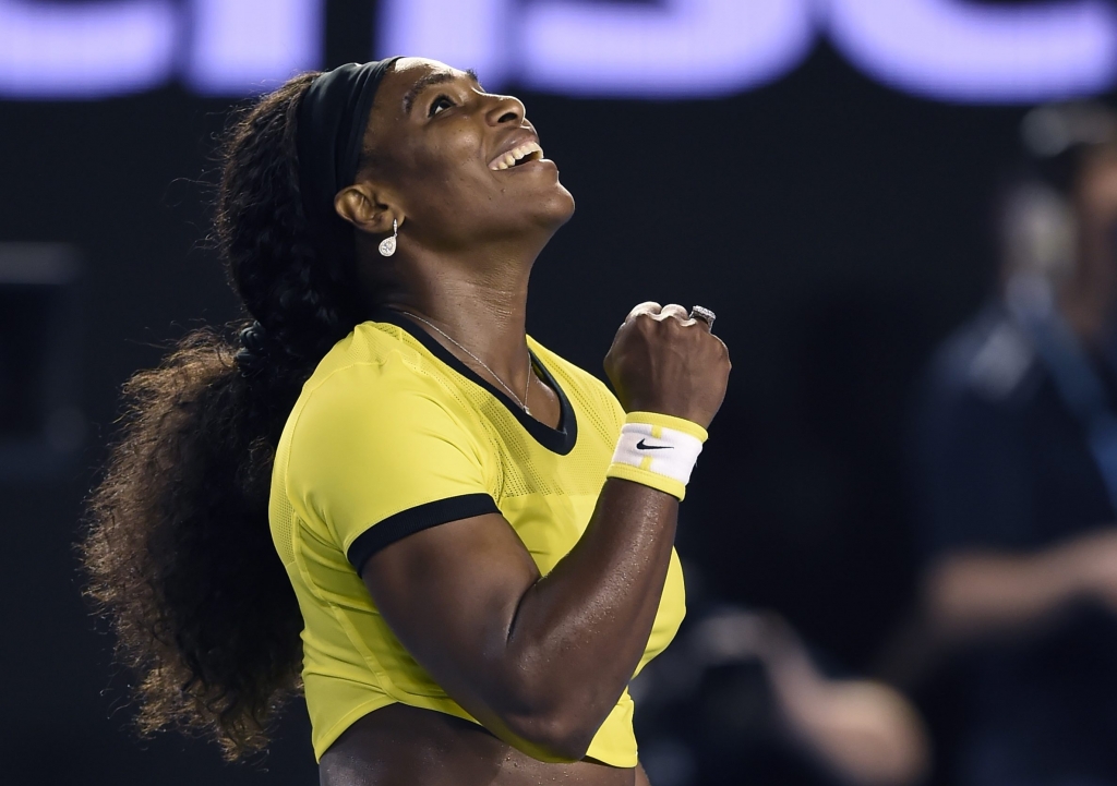 Serena Williams of the United States celebrates after defeating Agnieszka Radwanska of Poland in their semifinal match at the Australian Open tennis championships in Melbourne Australia Thursday Jan. 28 2016