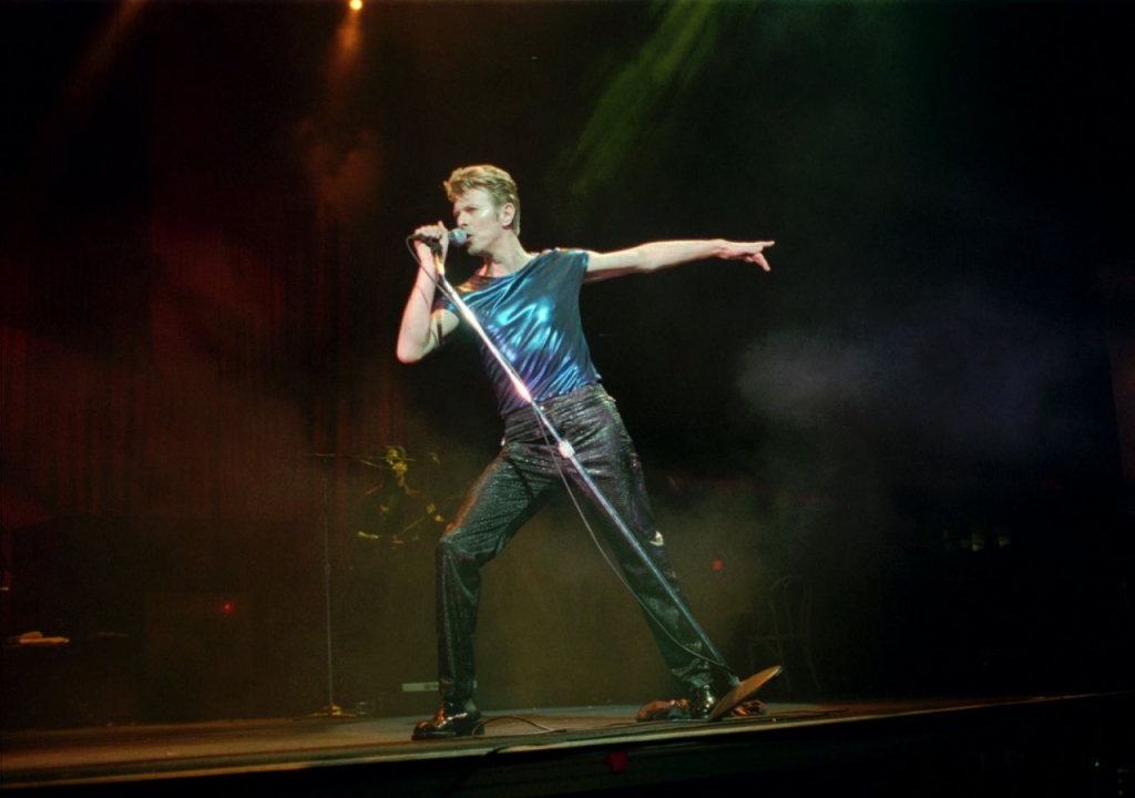 Singer David Bowie performs in Hartford Conn. in 1995. The Hartford concert is the first stop for Bowie on his new tour