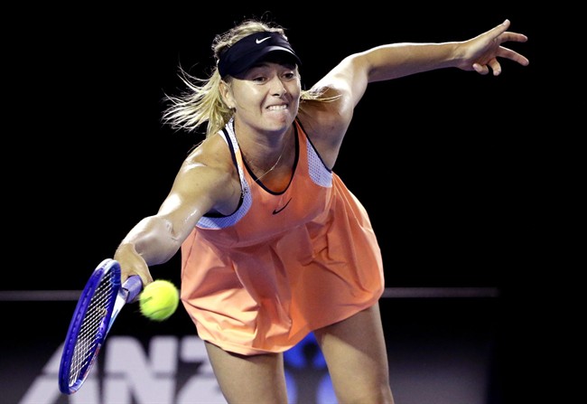 Maria Sharapova of Russia hits a forehand return to Lauren Davis of the United States during their third round match at the Australian Open tennis championships in Melbourne Australia Friday Jan. 22 2016