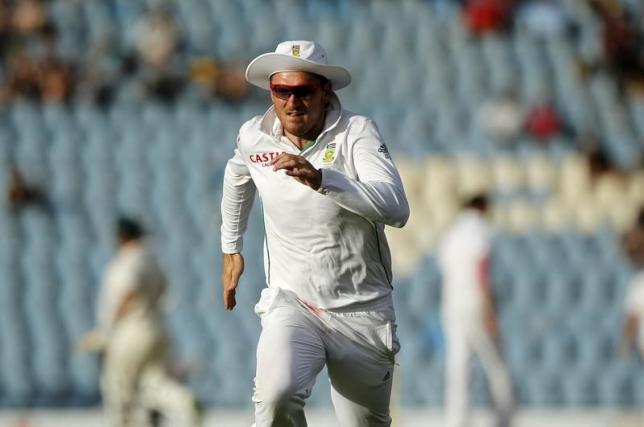 South Africa's Graeme Smith runs after a ball after he failed to make a catch during the third day of their test cricket match against Australia in Centuri