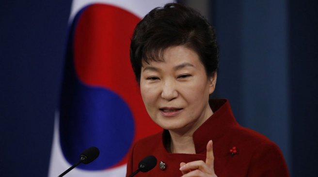 South Korea's President Park Geun-hye answers a reporter's question during her New Year news conference at the Presidential Blue House in Seoul