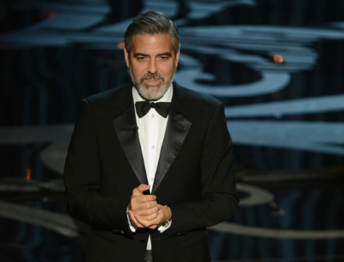 AFP  File  Robyn Beck George Clooney speaks onstage at the 85th Annual Academy Awards