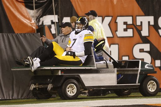 Pittsburgh Steelers Ben Roethlisberger is taken off the field after getting sacked by Cincinnati Bengals Vontaze Burfict during the second half of an NFL wild-card playoff football game Saturday Jan. 9 2016 in Cincinnati. (AP