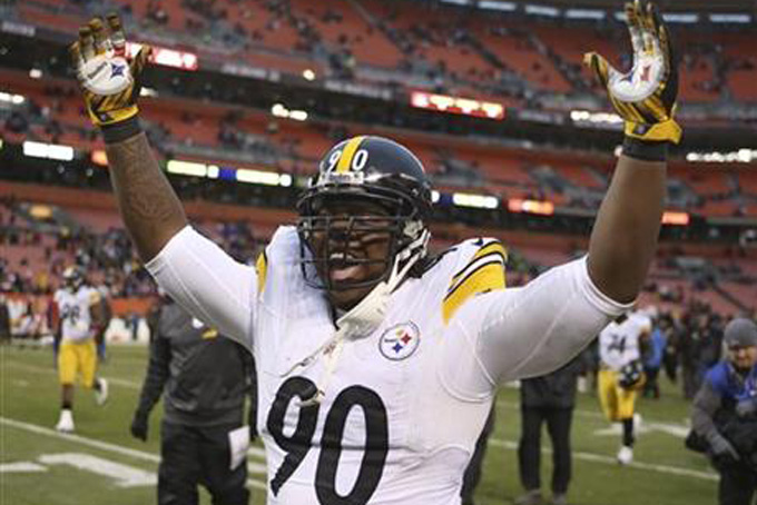 Pittsburgh Steelers nose tackle Steve Mc Lendon celebrates after the Steelers defeated the Cleveland Browns 28-12 in an NFL football game Sunday Jan. 3 2016 in Cleveland