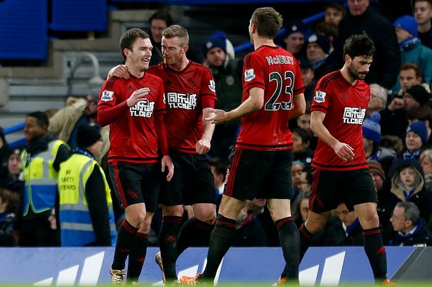 Craig Gardner celebrates scoring for Albion to make it 1-1 at Chelsea