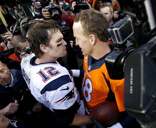 New England Patriots quarterback Tom Brady and Denver Broncos quarterback Peyton Manning speak to one another following the NFL football AFC Championship game between the Denver Broncos and the New England Patriots Sunday Jan. 24 2016 in Denver