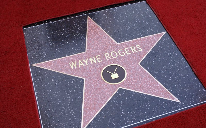 Actor Wayne Rogers’ star is unveiled at the Hollywood Walk of Fame Dec. 13 2005. With an acting career spanning for almost 50 years Rogers is best known for playing the role of “Trapper John McIntyre” in the long-running U.S. television series M