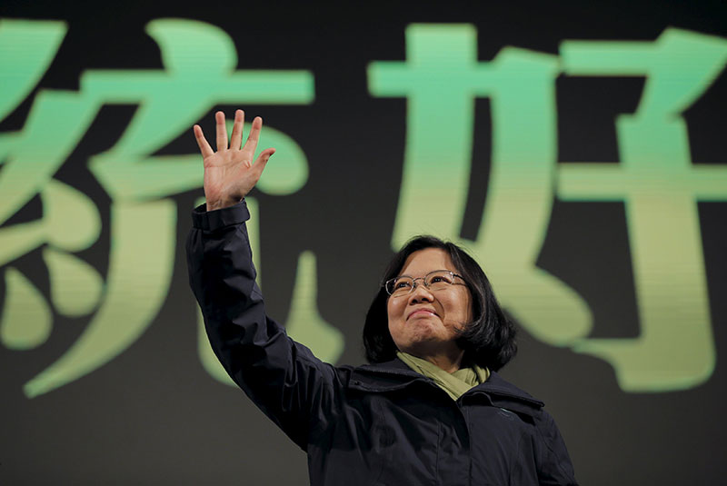 Democratic Progressive Party Chairperson and presidential candidate Tsai Ing-wen waves to her supporters after her election victory at party headquarters in Taipei Taiwan