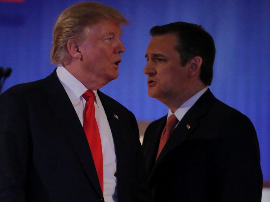 Republican US presidential candidate businessman Donald Trump and rival candidate Senator Ted Cruz cross paths during a break at the Fox Business Network Republican presidential candidates debate in North Charleston South Carolina