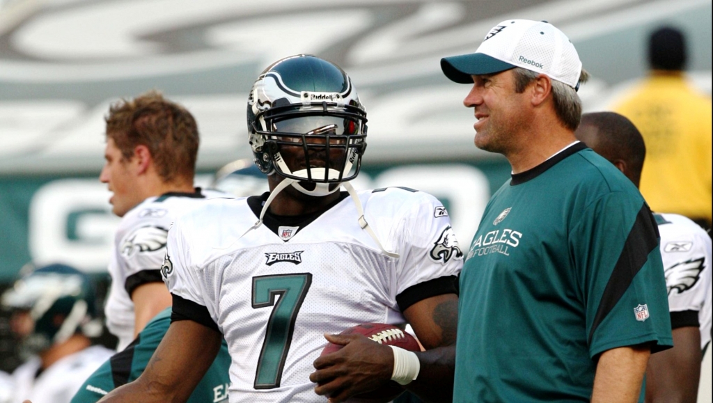 PHILADELPHIA PA- AUGUST 27 Michael Vick #7 of the Philadelphia Eagles talks to coach Doug Pedersen before the preseason game against the Jacksonville Jaguars at Lincoln Financial Field