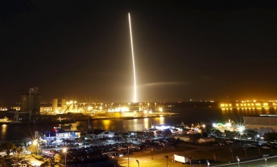 The first stage of the SpaceX Falcon 9 shown in a time exposure at Cape Canaveral Fla. on Dec. 21