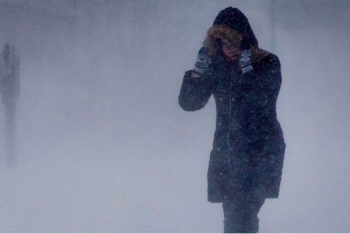 Person walking in snow snow storm