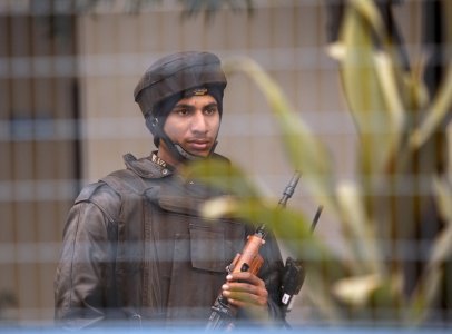 An Indian security personnel stands guard inside the Indian Air Force base at Pathankot in Punjab India