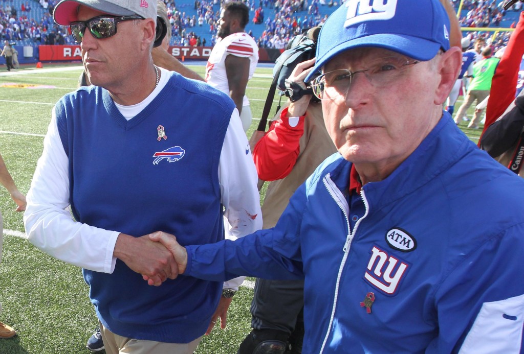 Tom Coughlin shakes hands with Bills coach Rex Ryan after the Giants won in Buffalo in Week Four of this past season.			
		James P. McCoy  Buffalo News