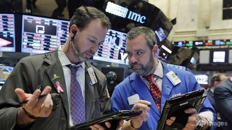 Traders work on the floor of the New York Stock Exchange.
   
 

  Enlarge  Caption