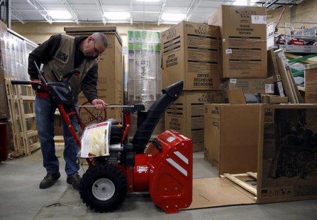 Troy-Bilt representative David Bowles assembles a snow blower at the Lowe's store in Kentlands Maryland