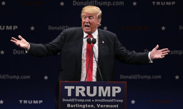 Republican presidential candidate Donald Trump asked security guards to steal a protester's coat during a Burlington Vt. rally Thursday night