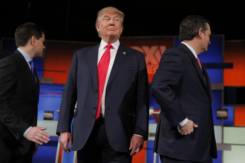 Trump looks to grab attention as GOP rivals debate