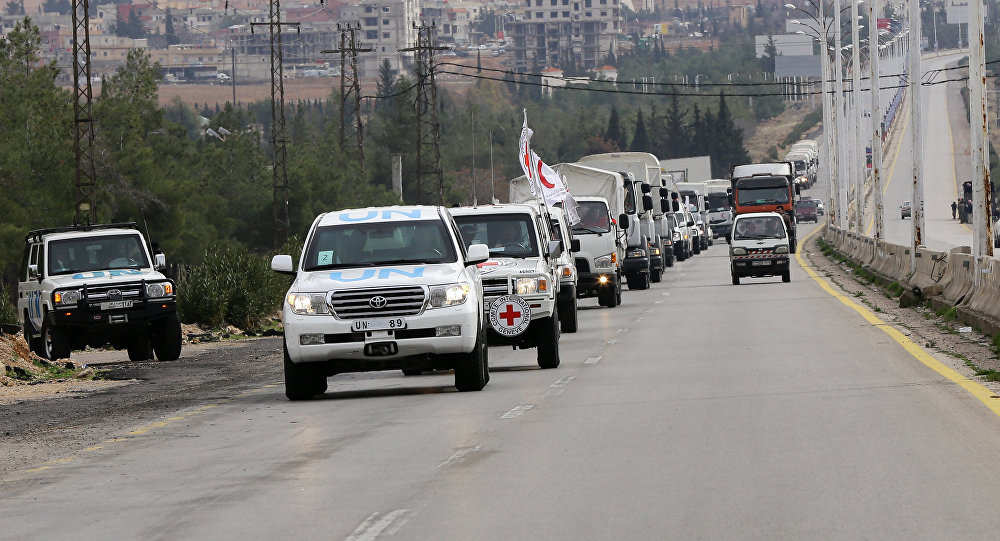 Aid convoys carrying food medicine and blankets leave the Syrian capital Damascus as they head to the besieged town of Madaya