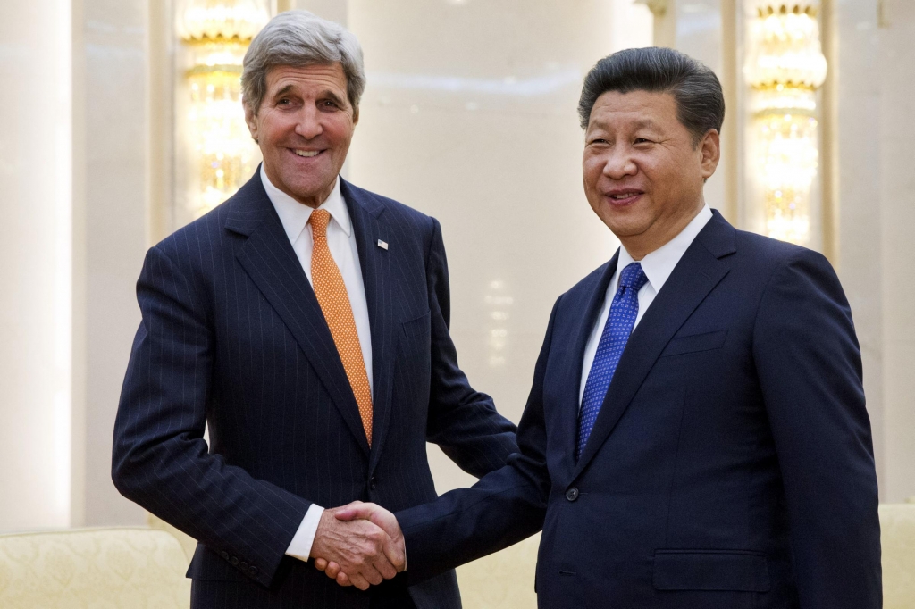 U.S. Secretary of State John Kerry left poses with Chinese President Xi Jinping prior to their meeting at the Great Hall of the People in Beijing Wednesday Jan. 27 2016. REUTERS  Jacquelyn Martin  Pool