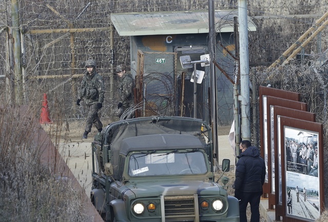 ASSOCIATED PRESS           South Korean army soldiers walk to get a ride on a military truck at the Imjingak Pavilion in Paju near the border of North Korea and South Korea today