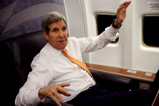 U.S. Secretary of State John Kerry speaks to journalists about his negotiations with Iran upon his arrival from Vienna at Joint Base Andrews in Washington