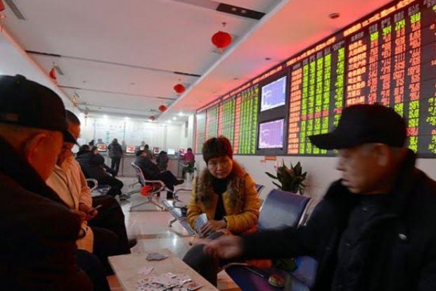 Chinese shares extend losses in volatile trading session