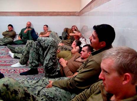 Iranian Revolutionary Guards on Wednesday Jan. 13 2016 shows detained American Navy sailors in an undisclosed location in Iran. Iranian state television is reporting that all 10 U.S. sailors detained by Iran after entering