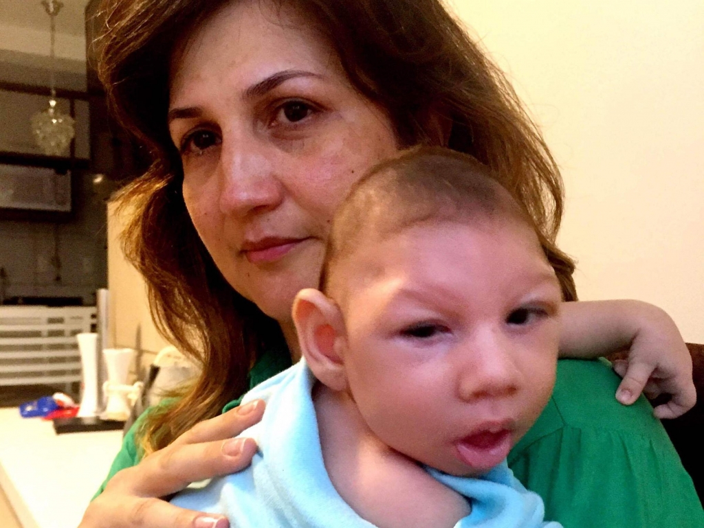 Marilla Lima had Zika virus while pregnant. Her 2 1/2-month-old son Arthur has microcephaly — a birth defect characterized by a small head and severe brain damage