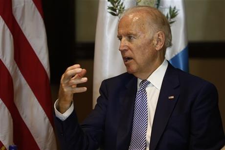 U.S. Vice President Joe Biden right speaks during a meeting with Guatemala's president-elect Jimmy Morales in Guatemala City Thursday Jan 14 2016. Biden is on a one day trip to attend Morales presidential inauguration