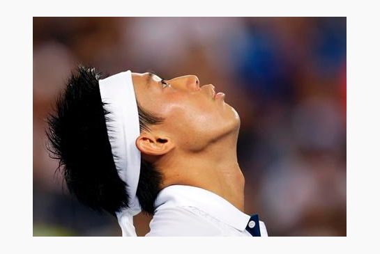 Kei Nishikori of Japan reacts to a lost point during his second round match against Austin Krajicek of the United States during their second round match at the Australian Open tennis championships in Melbourne Australia Wednesday Jan. 20 2016.(AP Phot