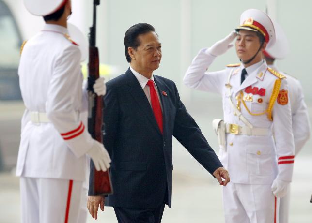 Vietnam's Prime Minister Nguyen Tan Dung arrives for the opening ceremony of the 12th National Congress of Vietnam's Communist Party in Hanoi Vietnam