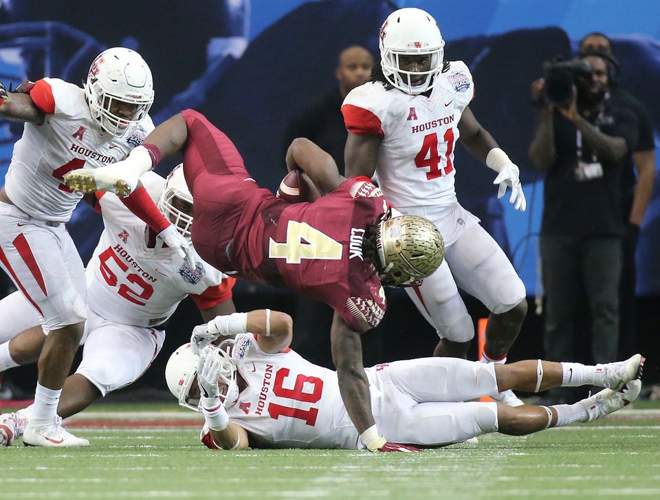 Maguire throws 4 picks Florida State falls to Houston 38-24