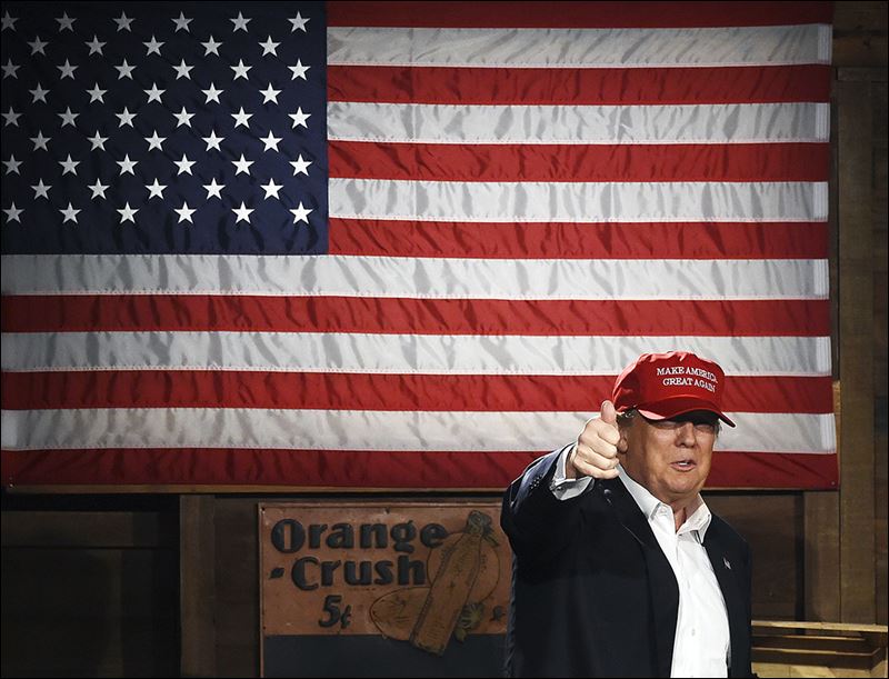 Republican presidential candidate Donald Trump arrives on stage before speaking during a campaign stop on Wednesday in Gilbert S.C