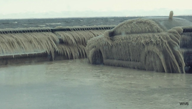 Waves off Lake Erie encase a car in ice on Jan. 11 2016