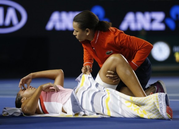 Wawrinka knocked out of Australian Open by Raonic in five-set epic