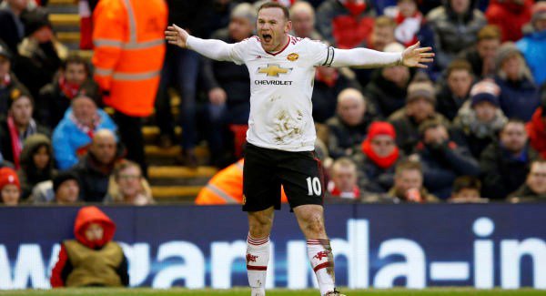 Wayne Rooney celebrates scoring the winning goal against Liverpool in Anfield