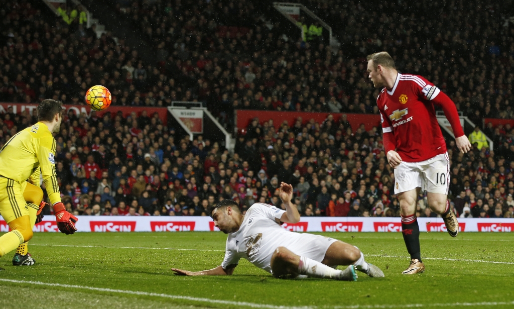 Wayne Rooney scores against Swansea City at Old Trafford