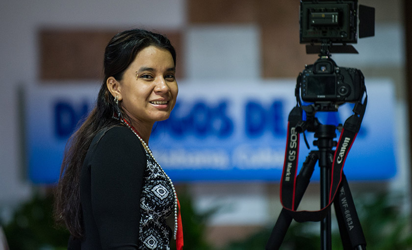 A FARC delegation next to her camera at Convention Palace in Havana during peace talks with the Colombian government on Dec 10 2015. From combat boots to high heels the FARC rebels deemed that being in front of a camera could be even more intimidating