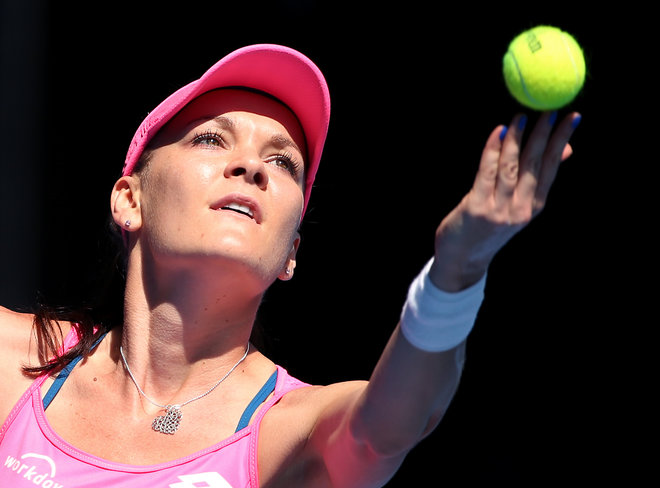 Agnieszka Radwanska of Poland serves to Carla Suarez Navarro of Spain during their quarterfinal match at the Australian Open tennis championships in Melbourne Australia Tuesday Jan. 26 2016