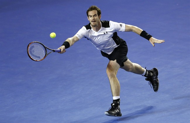 Andy Murray of Britain reaches for a forehand return to David Ferrer of Spain during their quarterfinal match at the Australian Open tennis championships in Melbourne Australia Wednesday Jan. 27 2016