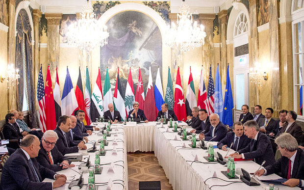 World leaders and diplomats discussing the Syrian situation in Vienna October 2015