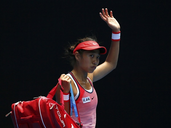 Zhang Shuai waves to her fans after losing to Konta