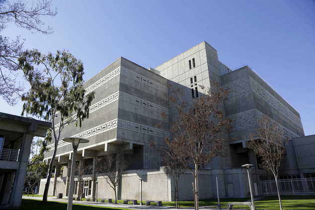 The exterior of Central Men's Jail in Santa Ana Calif. is seen Monday Jan. 25 2016. Three inmates including a man suspected of a killing cut through