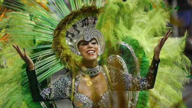 A dancer from the Unidos do Peruche samba school performs during a carnival parade in Sao Paulo