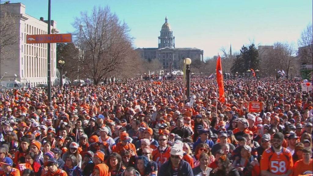 A sea of orange and blue during a Broncos Super Bowl rally and parade on Tuesday