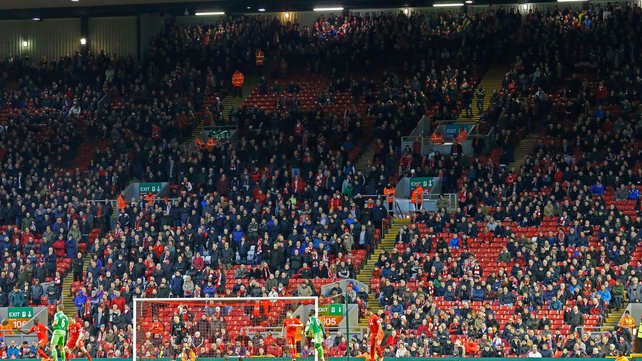 A significant number of Liverpool fans left Anfield in the 77th minute during the Barclays Premier League draw against Sunderland on Saturday