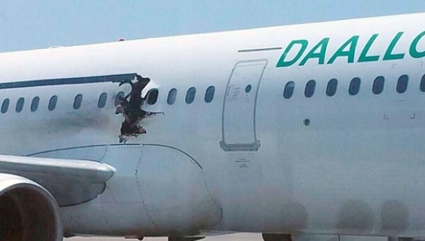 A suicide bomber was sucked out of the hole on the side of the plane after committing suicide