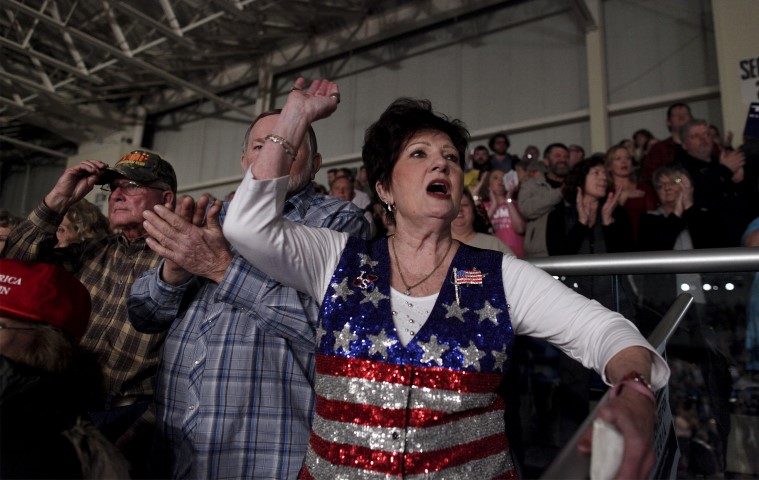 A supporters yells as Donald Trump enters a rally at the Sumter Civic Center in Sumter South Carolina