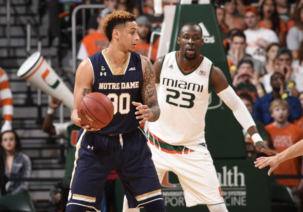 03 February 2016 Notre Dame University forward Zach Auguste is guarded by University of Miami center Tonye Jekiri in Miami's 79-70 victory at Bank United Center Coral Gables Florida